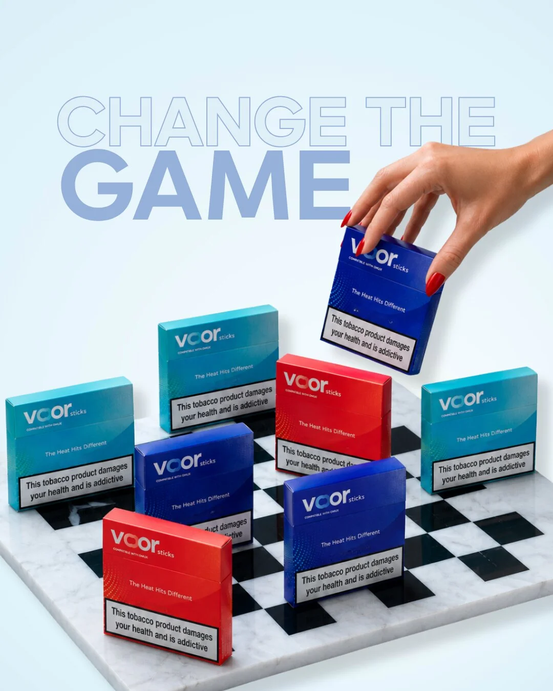 Cajetillas voor sobre un tablero de ajedrez con el lema Change the Game.
